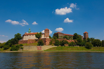 Naklejka na ściany i meble Wawel Castle Viewed from the Vistula river. The belltower of Wawel Cathedral can also be seen 