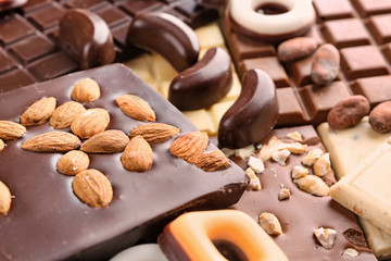 Delicious chocolate with candies, closeup