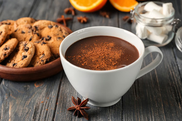 Cup of hot chocolate on wooden table