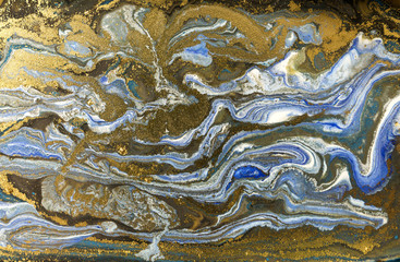 Gold marbling texture design. Blue and golden marble pattern. Fluid art.