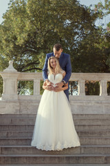 young happy romantic wedding couple outdoors in city