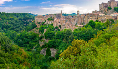 Fototapeta na wymiar Panorama of the beautiful medieval village of Sorano located on the edge of the cliff, Tuscany. Italy. Europe