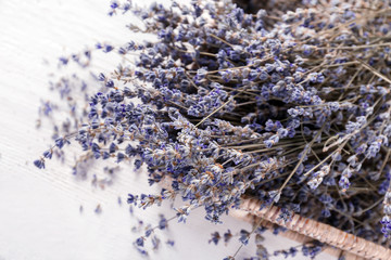 Wicker tray with beautiful lavender flowers on white background, closeup