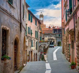 A beautiful street in a medieval town in Tuscany at sunset. Sorano. Italy