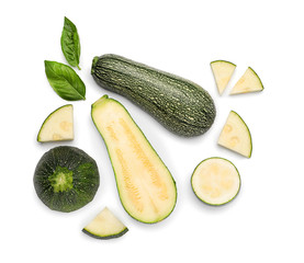 Top view composition with sliced zucchini on white background