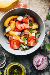 Delicious Greek salad or Horiatiki salad with ingredients