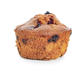 Sweet tasty muffin with berries on white background