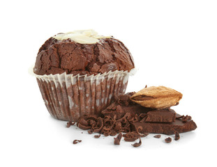 Sweet tasty chocolate muffin with almonds on white background