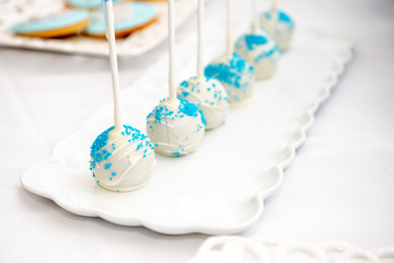Delicious sweets with blue garnishes.