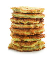 Stack of zucchini pancakes isolated on white