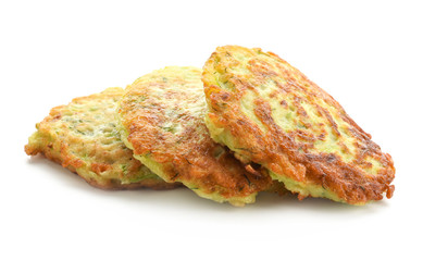 Zucchini pancakes isolated on white