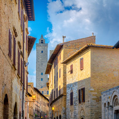 Street lights and a towers in the beautiful medieval city of San Gimmignano, Tuscany. Italy. Europe