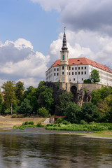 Fototapeta na wymiar View of the Děčín castle across the Elbe river, Czech republic