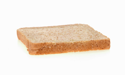 Whole wheat bread on white background.