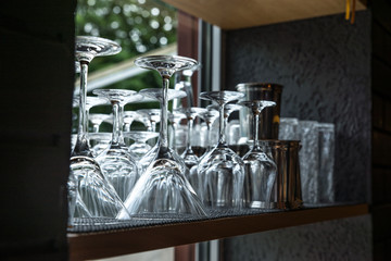 Abstract empty wine glasses, color background