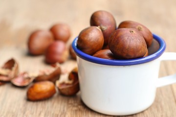 chestnuts seed on wood