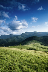Fototapeta na wymiar Carpathian mountains summer landscape with blue sky and clouds, natural outdoor background