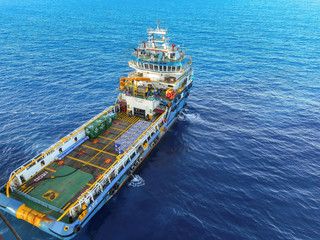 Offshore cargo ship view while offloading in offshore oil field: Terengganu offshore, Malaysia -...
