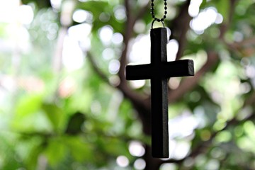 Wooden Christian cross background. Christianity symbol. Christianity Concept. Faith hope love concept.