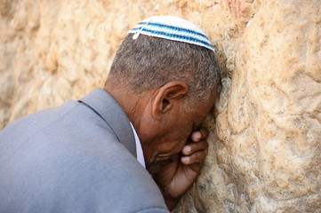 Religious Jews pray at the Western Wall in Jerusalem. Prayer of the Coens in honor of the Jewish holiday Pesach