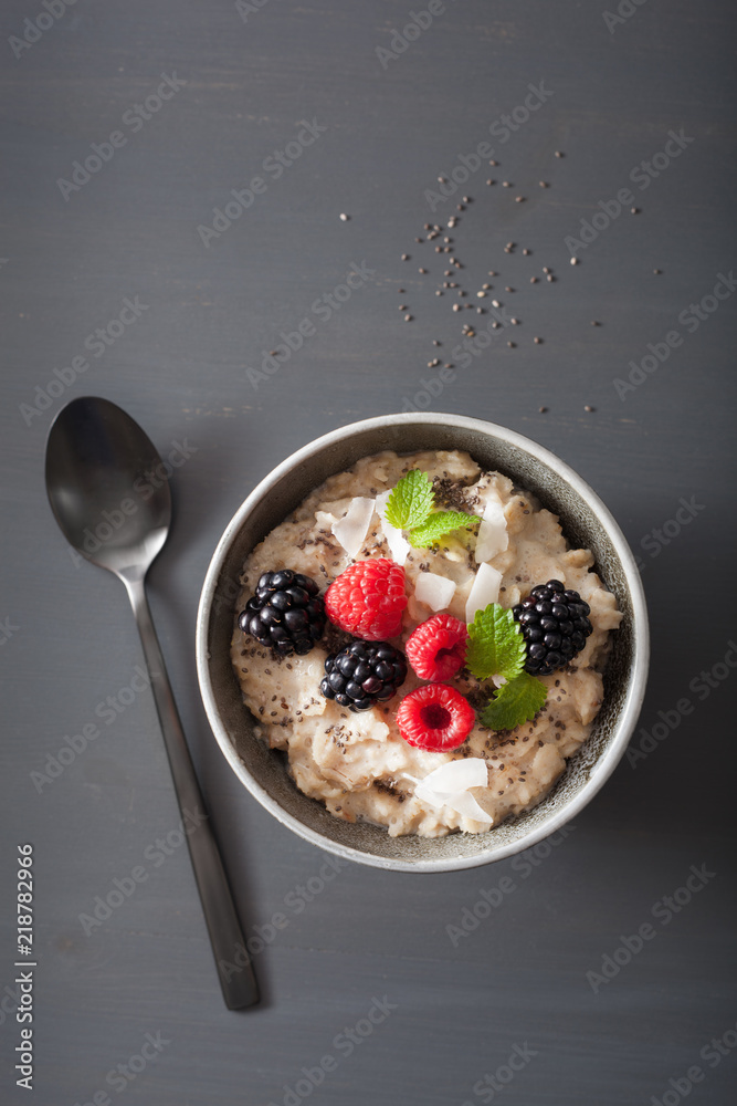 Wall mural healthy breakfast oatmeal porridge with raspberry blackberry