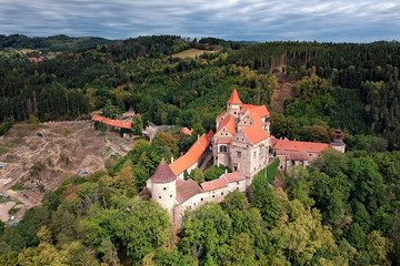 Obraz premium Gothic castle Pernstejn in Eastern region of the Czech Republic surrounded by forest