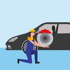 mechanic on the knee with brake disc auto part
