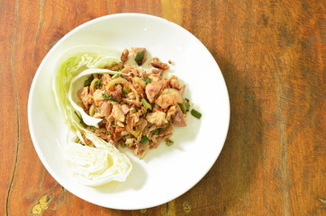 spicy grilled chicken Thai salad eat with cabbage on plate