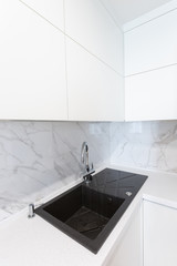 Modern minimalist sink in a kitchen room