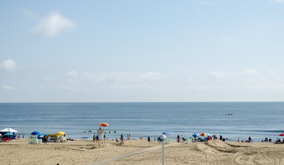 Fototapeta premium Beach landscape with blue day time sky on a sunny day