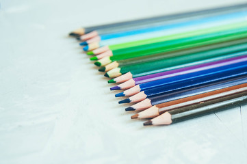 Naklejka premium color pencil with different color on white background