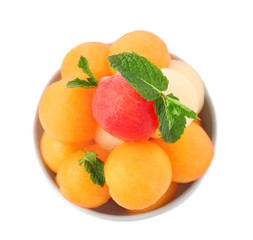 Bowl with fresh melon and watermelon balls on white background