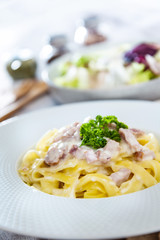 tasty Carbonara pasta on the table