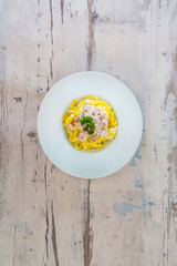 tasty Carbonara pasta on the table