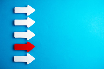 white arrows on a blue background. leadership purposefulness self-development concept