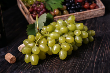 Fresh ripe grape on wooden table