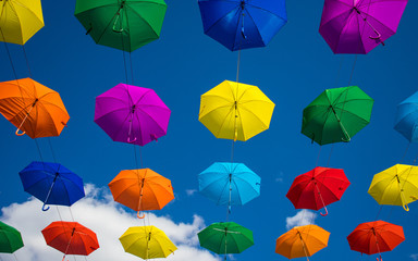 Fototapeta na wymiar Umbrellas in the sky 