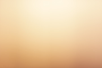 Golden glow abstract background gradient soft yellow and orange color