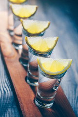 Drinking in a bar, glasses with strong alcohol