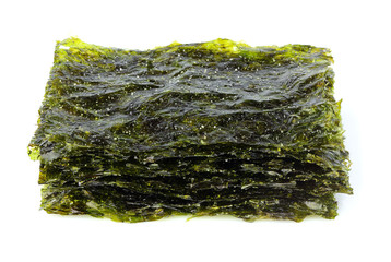 Crispy dried seaweed nori with salt isolated closeup. © osoznaniejizni