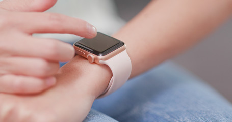 Woman use of smart watch