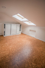 Cork floor lighted from the dormer