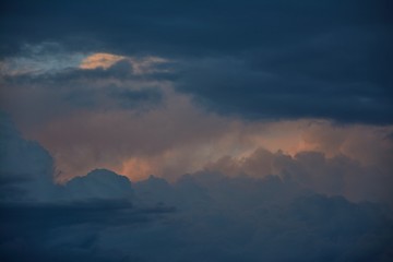 Turbulent clouds, boiling skies with layers of clouds before the storm.