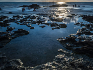 Long exposure sunset on Palmahim rocky Beach- Israel