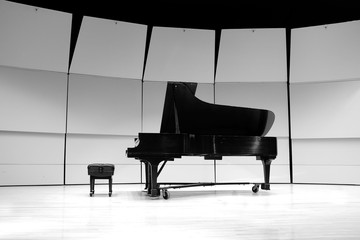 Black and White Piano on Concert Stage for Performance © Lane Erickson