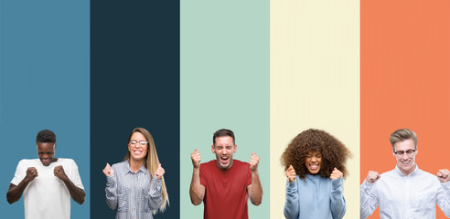Group of people over vintage colors background excited for success with arms raised celebrating...