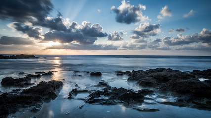 Long exposure sunset on Palmahim rocky Beach- Israel