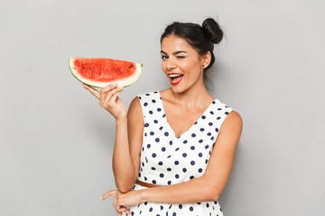 Portrait of a happy young woman in summer dress
