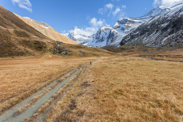 Fototapeta na wymiar walking at fall in a mountain valley