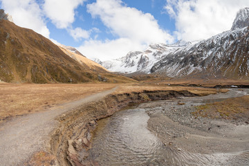 walking at fall in a mountain valley